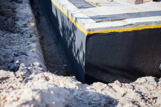Professional Basement Waterproofing technician working in Windsor, WI